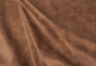 Close up of rich brown multitone distress upholstery leather