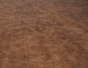 Close up of rich brown multitone distress upholstery leather