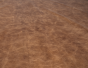 Close up of rich brown multitone distress upholstery leather