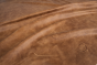 Close up of rich brown multitone distress upholstery leather