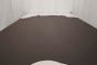 Picture of dark brown natural grain leather laying flat on a table