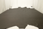 Picture of multi tone medium grey Italian leather for upholstery displayed on a table