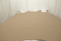 Picture of warm sand pigmented upholstery leather displayed on a table