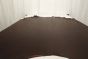 Picture of rich dark brown semi-aniline upholstery leather displayed on a table