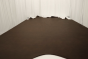 Picture of multitone dark brown natural grain leather displayed on a table