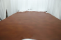 Picture of multitone cognac top grain upholstery leather displayed on a table