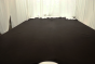 Picture of dark brown semi-aniline upholstery leather displayed on a table  