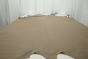 Picture of multitone distressed taupe semi-aniline leather for upholstery displayed on a table