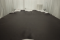 Picture of warm chocolate brown pigmented leather displayed on a table