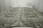 Grey designer pigmented upholstery leather displayed on a table