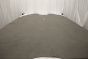 Grey colored semi aniline upholstery leather cowhide laying flat on a table