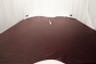 Picture of Wine Bar, dark burgundy semi-aniline leather hide for upholstery displayed on a table