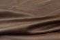 Close up picture of Vintage Redwood, a warm reddish brown leather and natural grain texture.