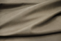 Closeup picture of Mellow Mist soft, medium grey colored upholstery leather for furniture