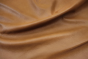 Closeup picture of Autumn Leaves, warm gold top grain leather for sofas, chairs, and other furniture upholstery