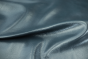 Close up picture of deep blue glazed full grain leather for upholstery