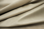 Closeup picture of Cotton Club soft, pearl grey colored upholstery leather for furniture