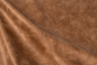 Close up of rich brown multitone distress upholstery leather