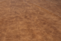 Close up of rich brown multitone distress upholstery leather