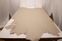 Picture of pearlized taupe pigmented upholstery leather displayed on a table