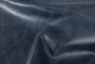 Close up of navy blue aniline dyed upholstery leather