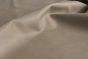 Close up of ivory taupe natural grain upholstery leather