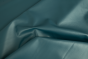 Picture of Teal Surprise nappa leather for upholstery showing smooth grain.