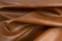 Close up picture of multitone cognac brown Italian upholstery leather