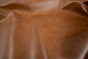 Close up picture of multitone cognac brown Italian upholstery leather