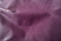Close up of dark purple with light undertones distress leather for upholstery