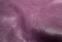 Close up of dark purple with light undertones distress leather for upholstery