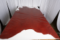 Picture of multitone red top grain upholstery leather displayed on a table