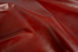 Close up of multitone red semi aniline upholstery leather