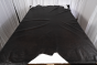 Picture of dark espresso brown aniline leather for upholstery displayed on a table