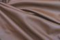 Close up picture of saddle brown pigmented leather for upholstery 
