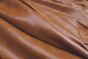 Close up picture of bourbon distressed aniline leather for upholstery
