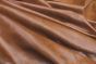 Close up picture of bourbon distressed aniline leather for upholstery