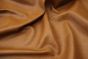 Closeup picture of Bourbon Street soft, bourbon colored upholstery leather for furniture