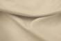 Close up picture of pearl colored pigmented upholstery leather 