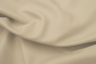 Close up picture of pearl colored pigmented upholstery leather 