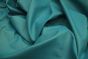 Picture showing the characteristics of a teal top grain leather hide