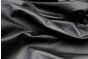 Close up picture of black leather for upholstery 