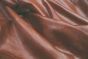 Close up picture of harness brown distressed aniline leather for upholstery