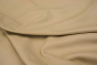 Close up of buttercream color premium top grain leather for upholstery