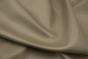 Close up of pearlized taupe top grain upholstery leather