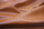 Closeup picture of Hangin in Harlem, warm brown top grain leather for sofas, chairs, and other furniture upholstery