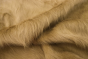 Close up picture of light tan hair on upholstery leather