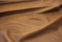 Picture showing the characteristics of warm gold natural grain leather for upholstery