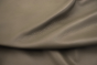 Close up of taupe pigmented upholstery leather 