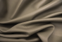 Close up of taupe pigmented upholstery leather 